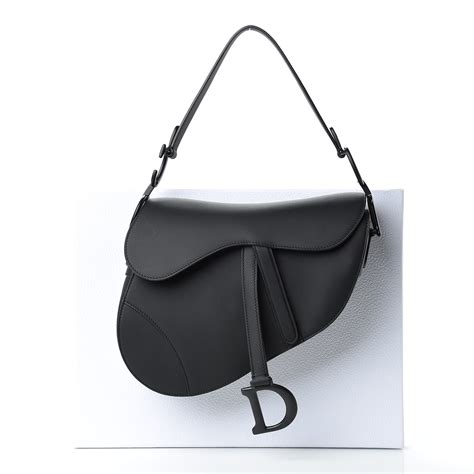 vintage black dior saddle bag.